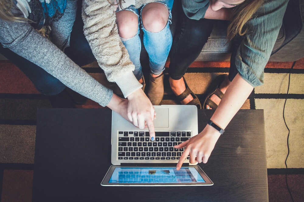 women looking at a laptop